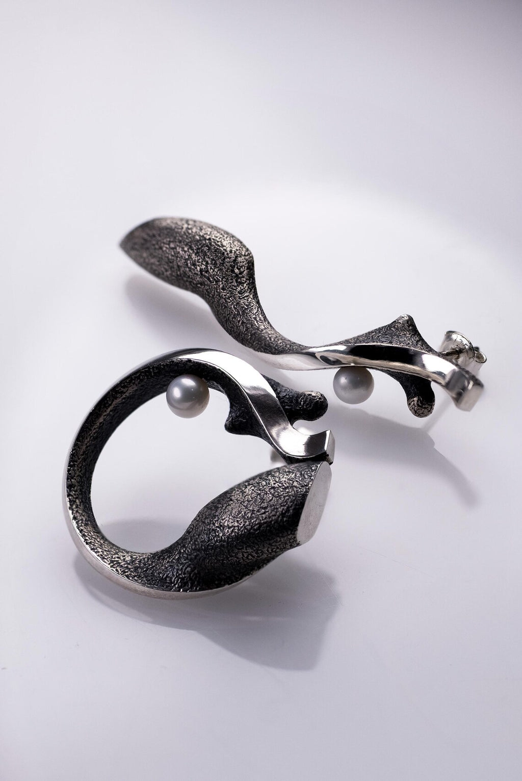 Organic modern art earrings inspired by woman silhouette design