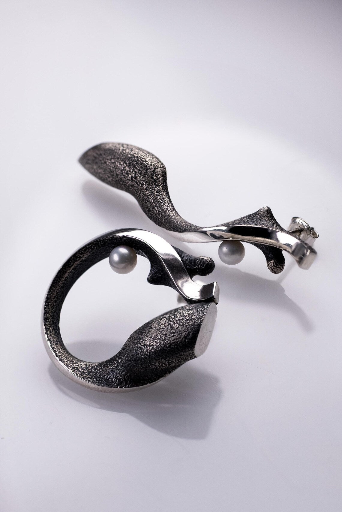 Organic modern art earrings inspired by woman silhouette design