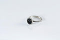Artisan silver rings with iridescent black druzy style gemstones