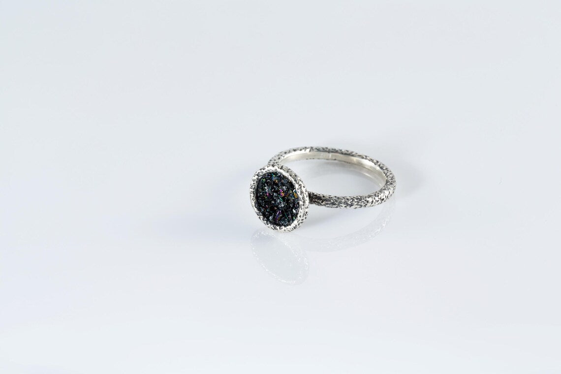 Artisan silver rings with iridescent black druzy style gemstones