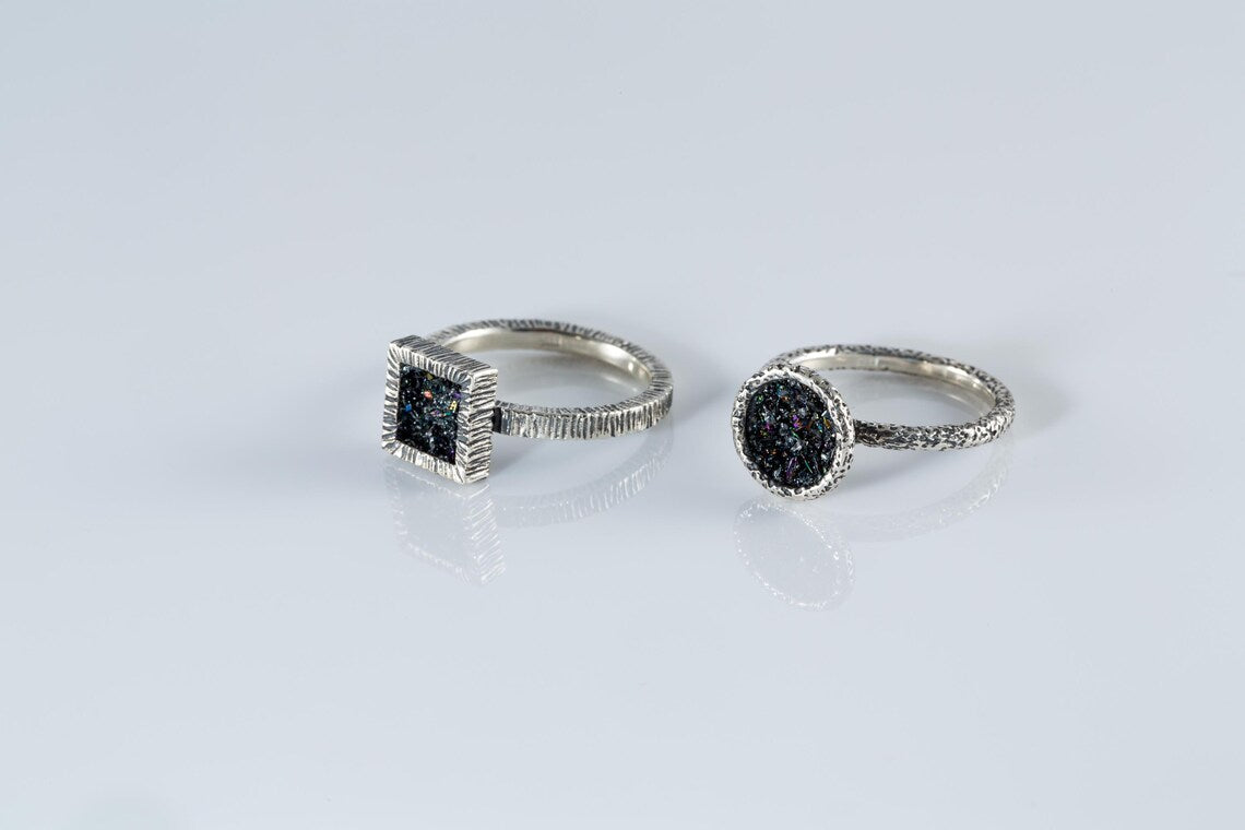 Handcrafted sterling silver druzy ring set with Rainbow Carborundum stones