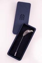 Handmade eagle lapel pin close-up
