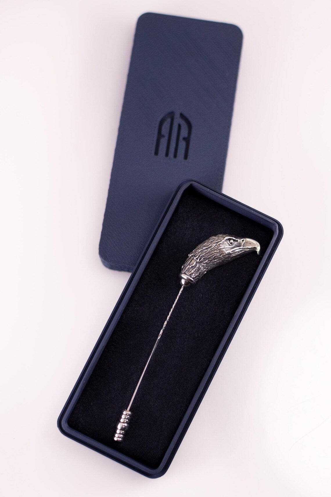 Handmade eagle lapel pin close-up