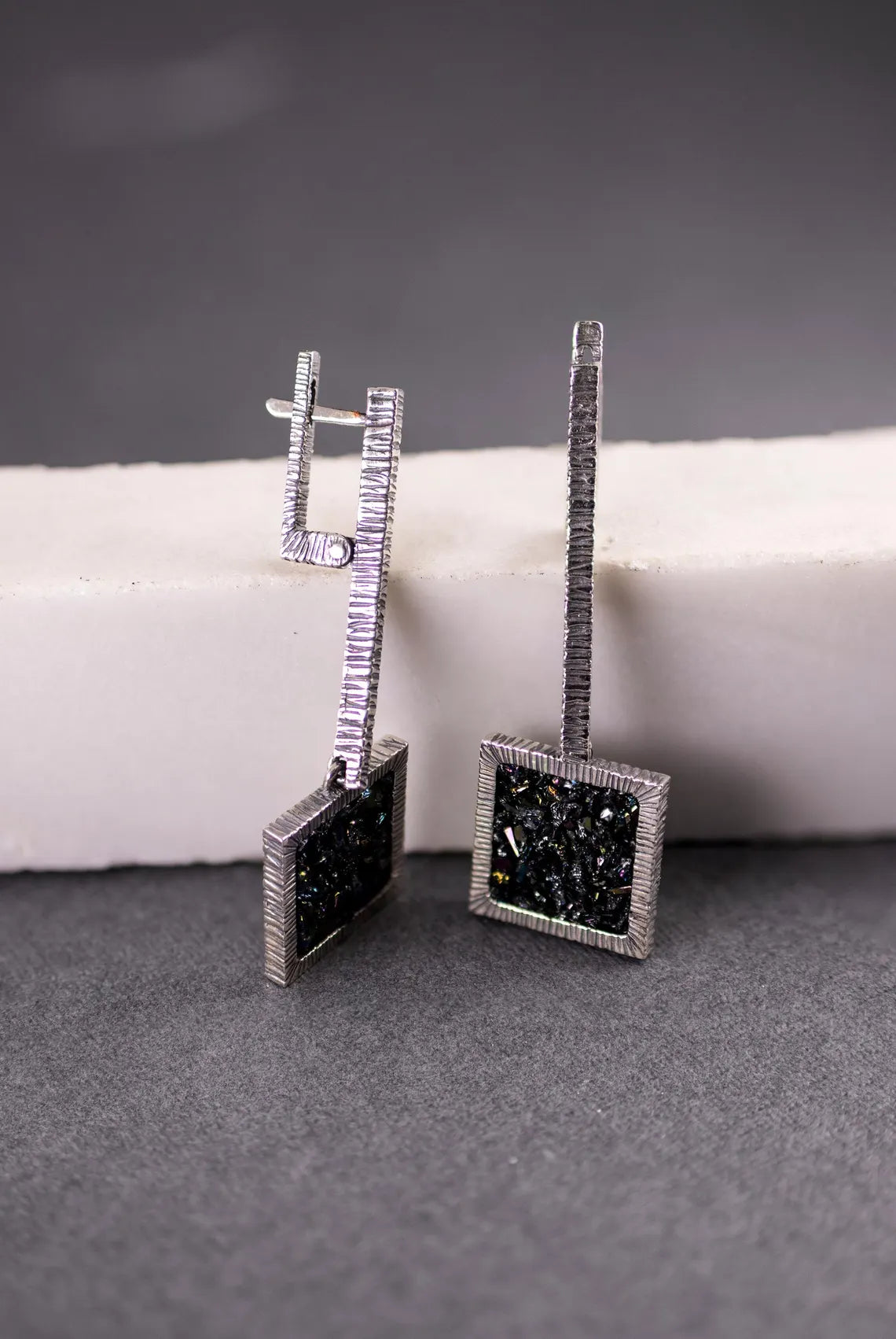 Iridescent crystal drop earrings with oxidized silver setting