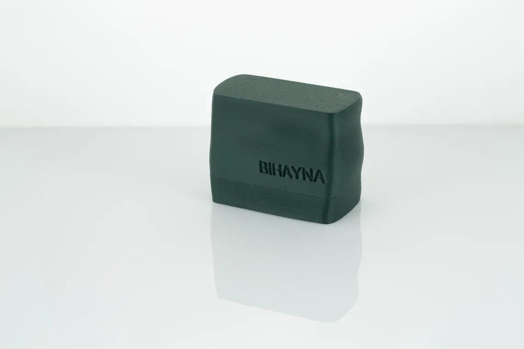 Dark green yoga block with 'BIHAYNA' branding on a white background