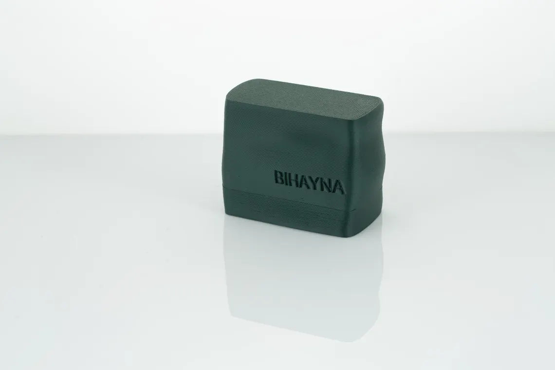 Dark green yoga block with 'BIHAYNA' branding on a white background