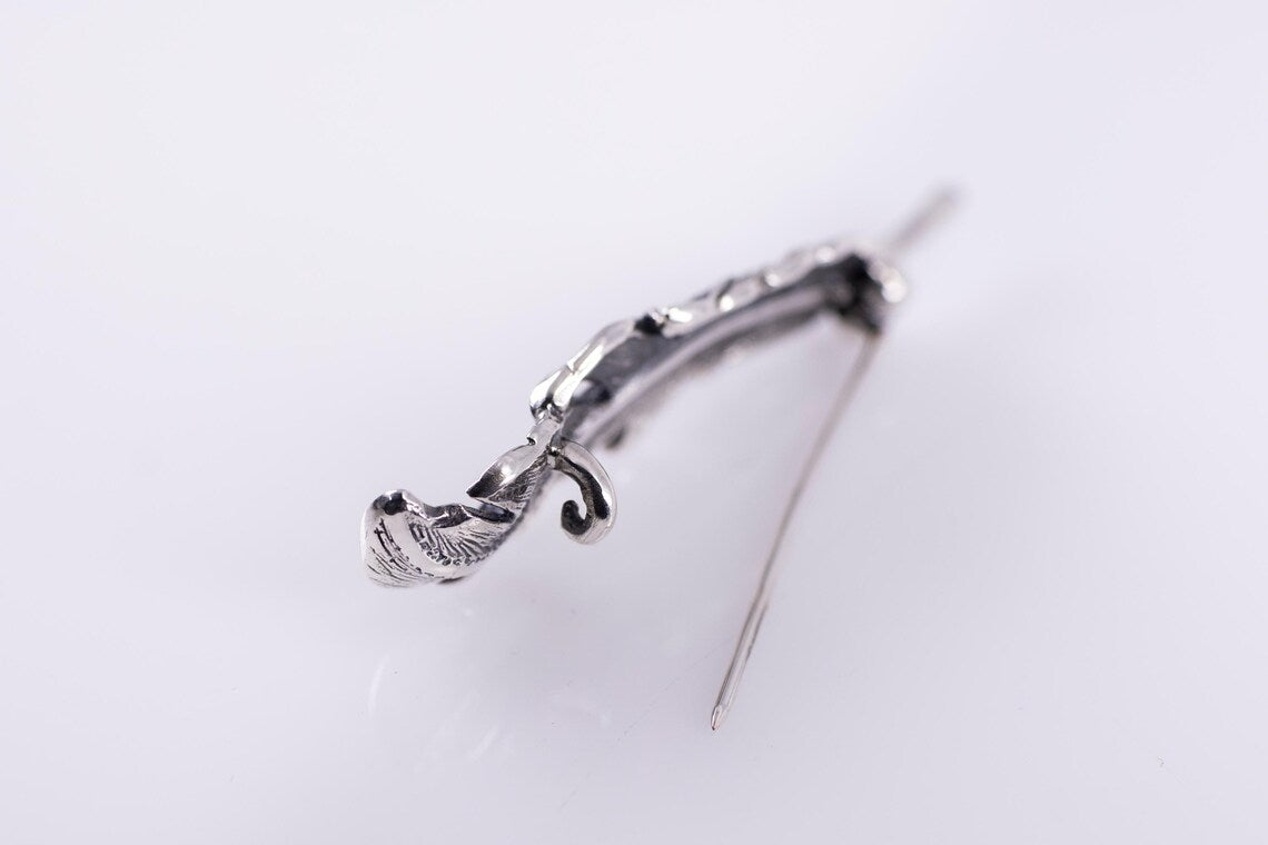 Feather sterling silver brooch detail