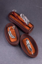 Artisan feather brooch in silver