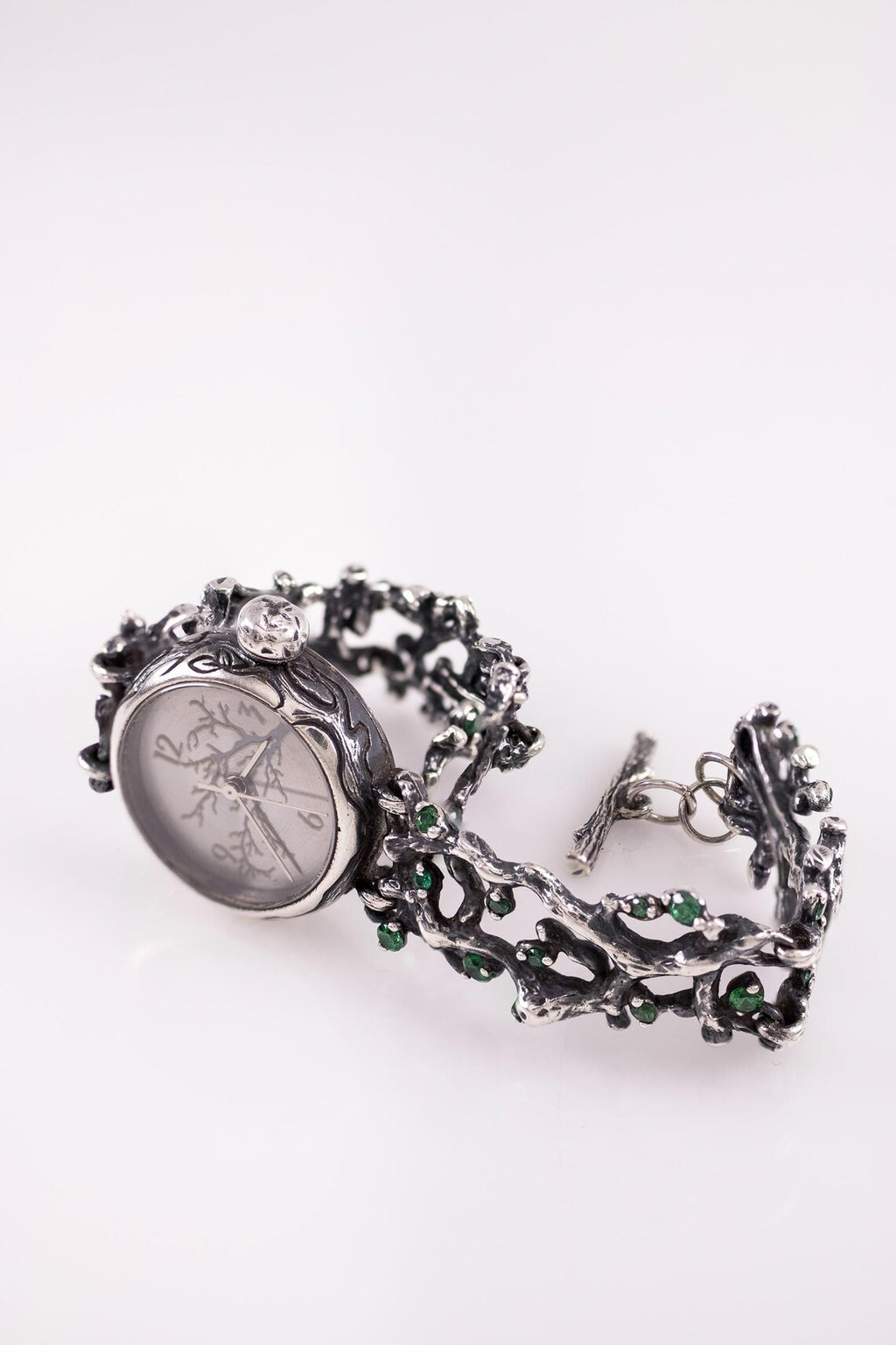 Nature-inspired artisan bracelet watch with oxidized silver finish