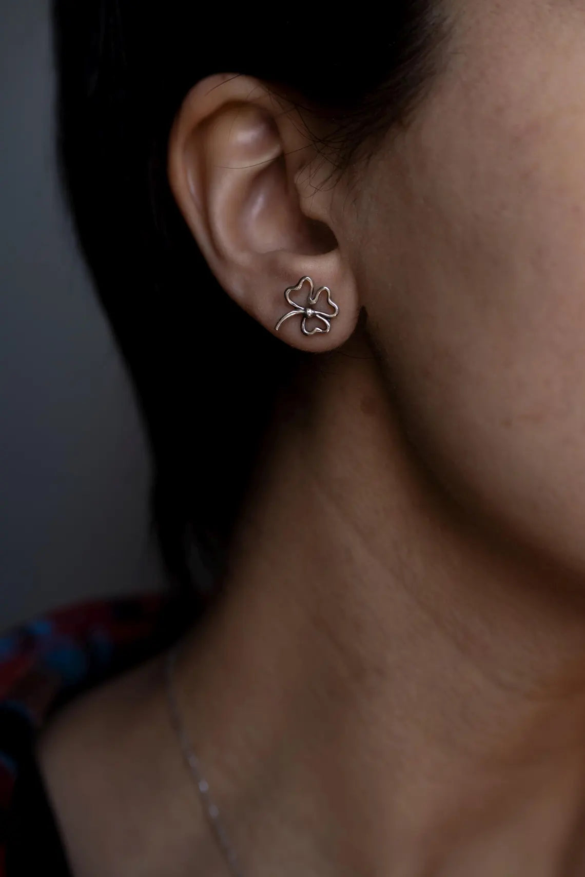 Handcrafted feather ear cuff close-up