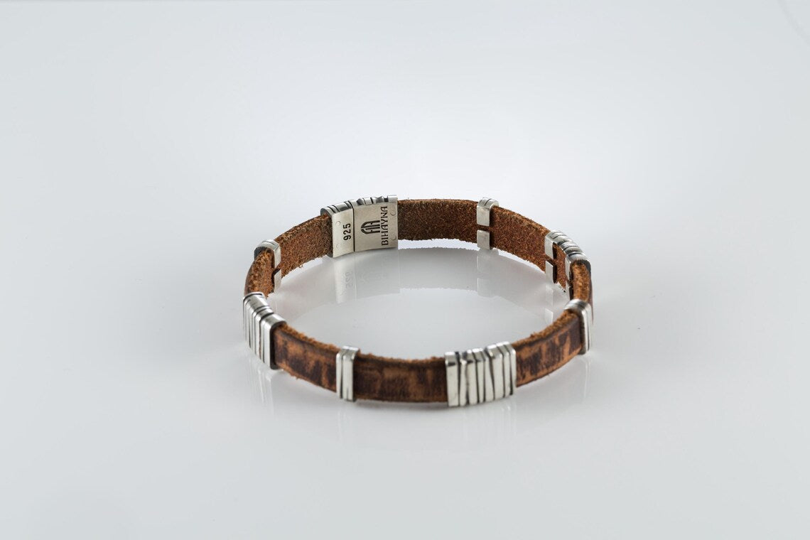 Black leather bracelet with silver clasp