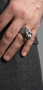 Sterling silver leopard head ring with green enamel eyes