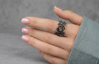 Handmade twig ring with green crystal accents