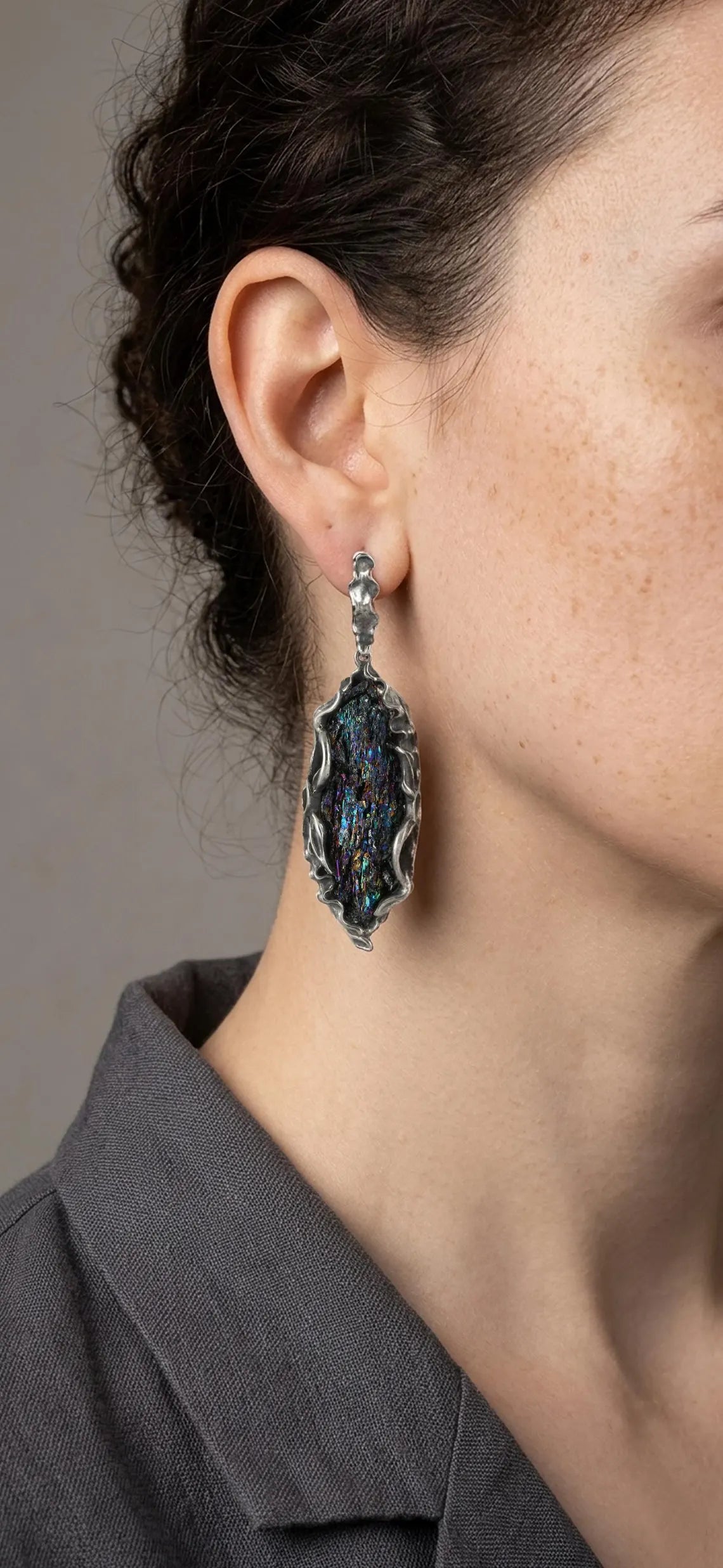 Iridescent raw crystal statement earrings with artisan silver setting
