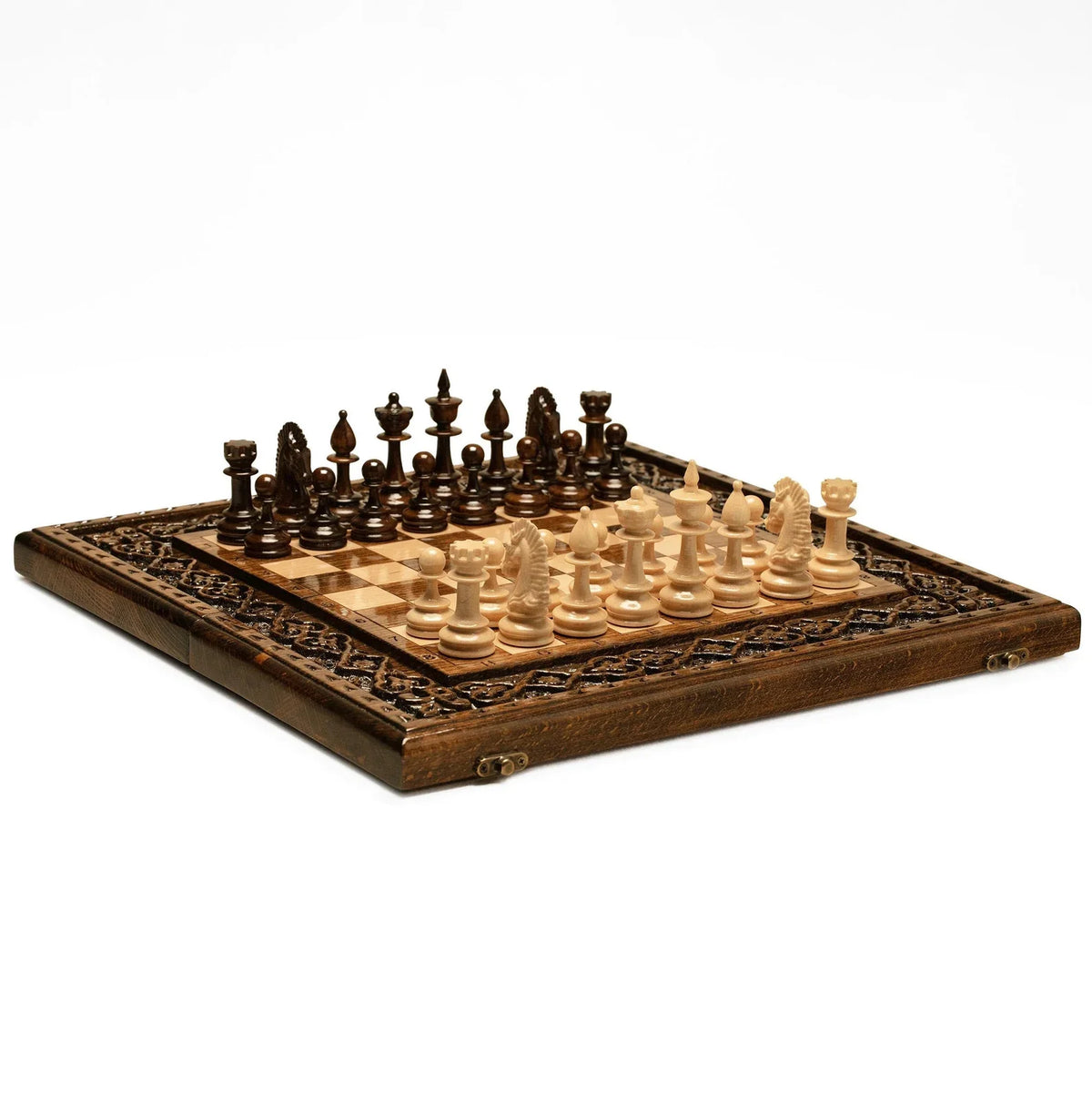 Handmade wooden chess set displayed open with pieces