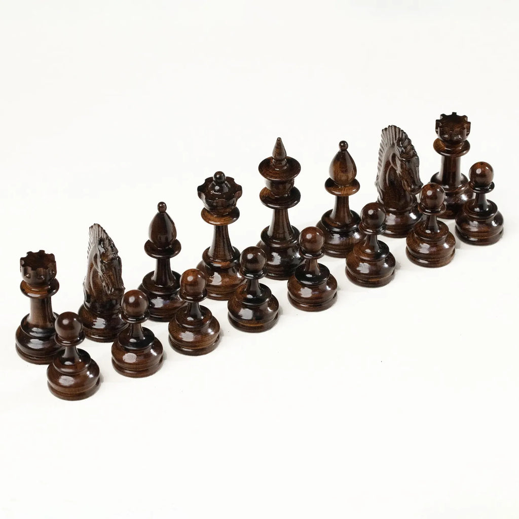 Light and dark carved chess pieces of the grapevine set