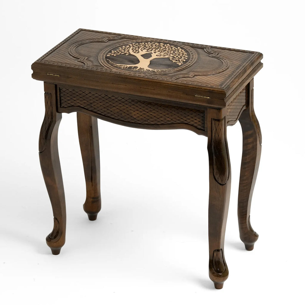 Wooden chess table set up with hand-carved chess pieces