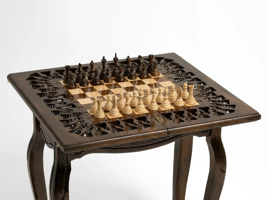Openwork Tree of Life carving on the wooden chess table