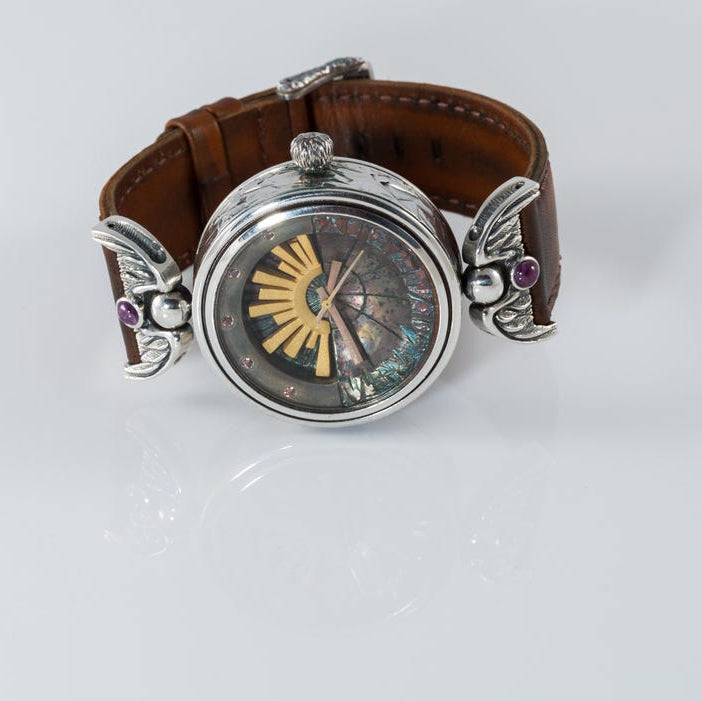 Artisan silver wrist watch with natural rubies and leather strap