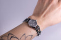 Handmade sterling silver tree branch watch with green gemstones