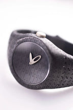 Minimalist silver watch with textured strap and sapphire crystal