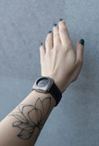 Modern minimalist silver watch with geometric dial design