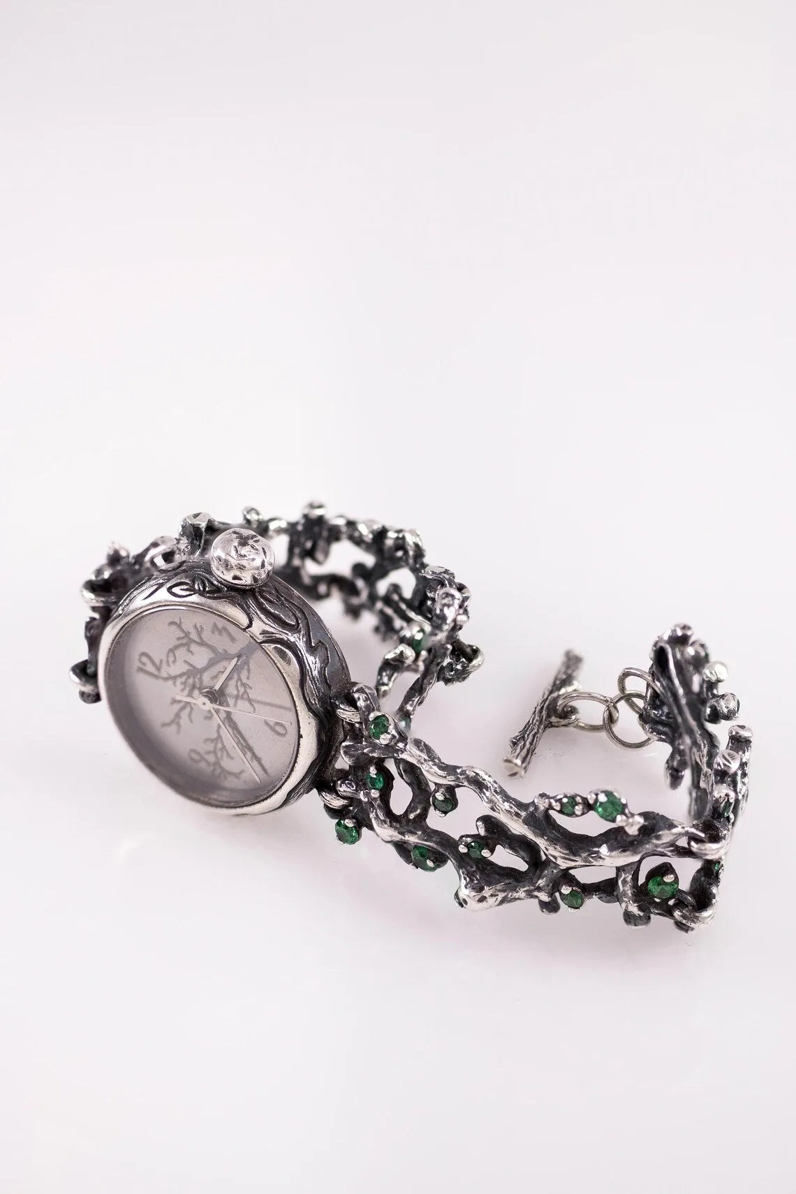 Nature-inspired artisan bracelet watch with oxidized silver finish